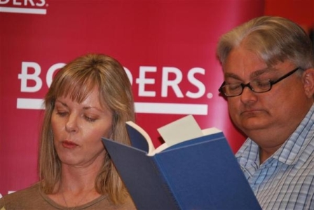 Melissa Anderson and Mark reading from the book